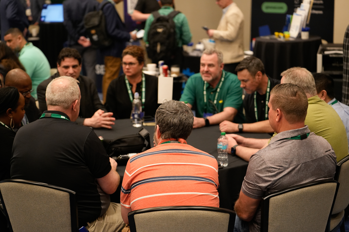 Small group of cohorts in conversation.